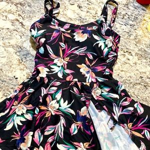 Adorable swim skirted suit. Flattering. Soft cups. Fits more like a size 6/8.